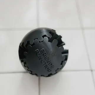 Неведомая штука круглая зубчатая черная