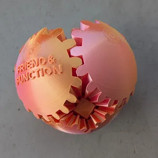 Неведомая штука круглая зубчатая розово-оранжевая